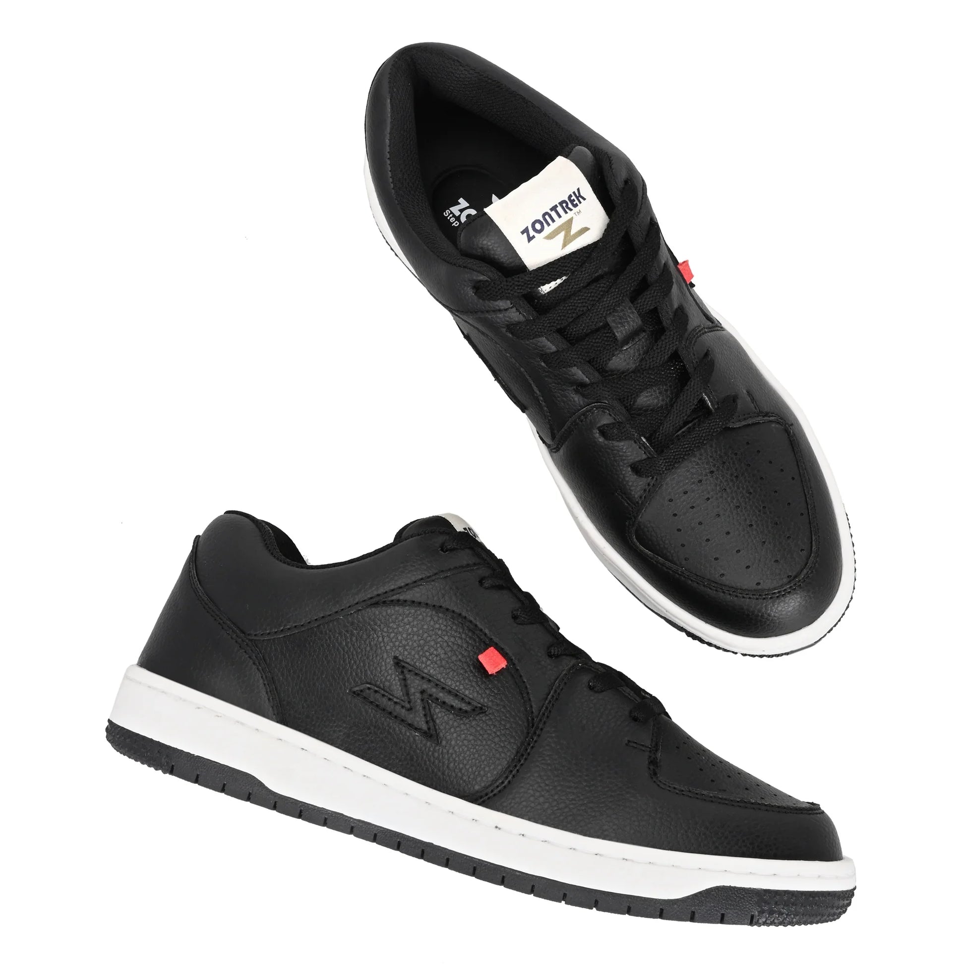 Black sneakers with white soles on a white background