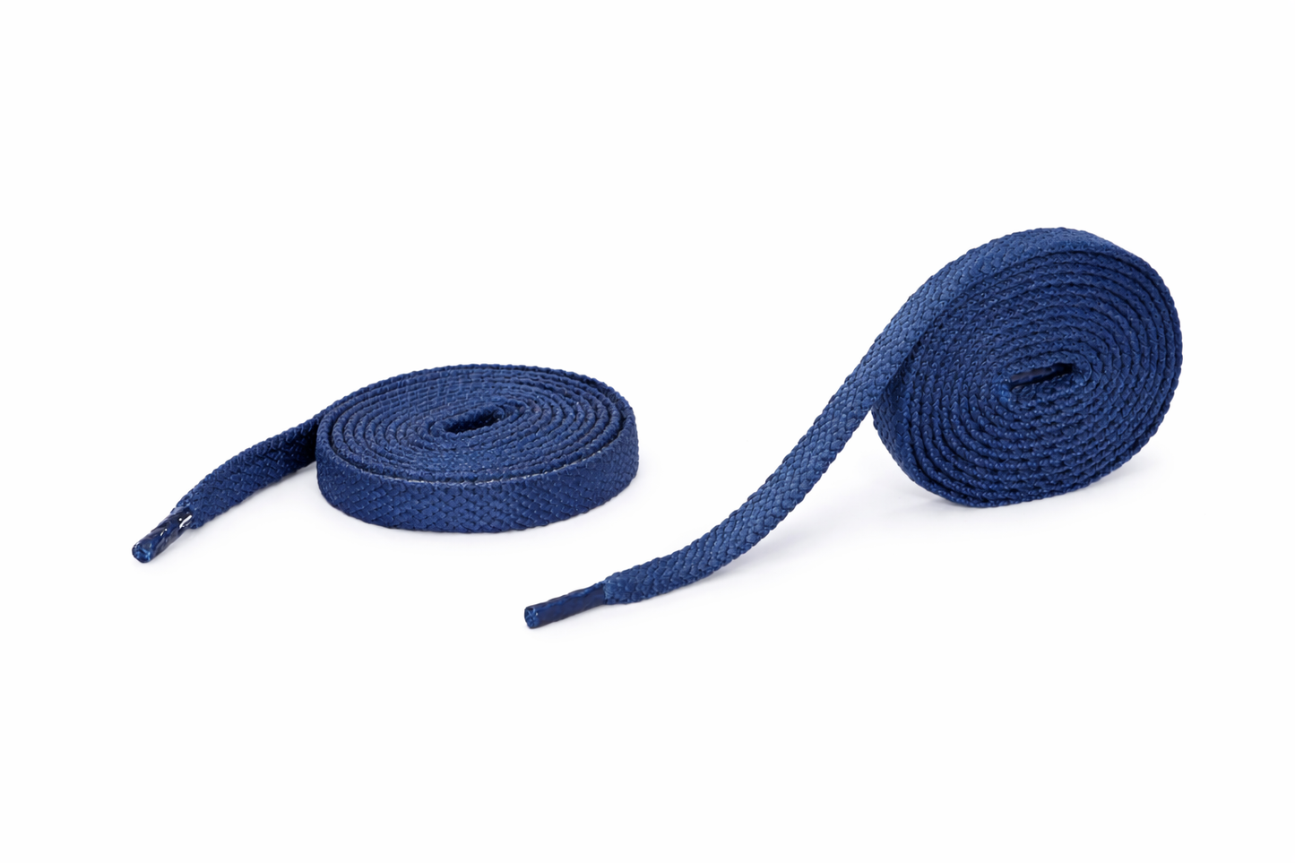 Two rolls of blue shoelaces on a white background
