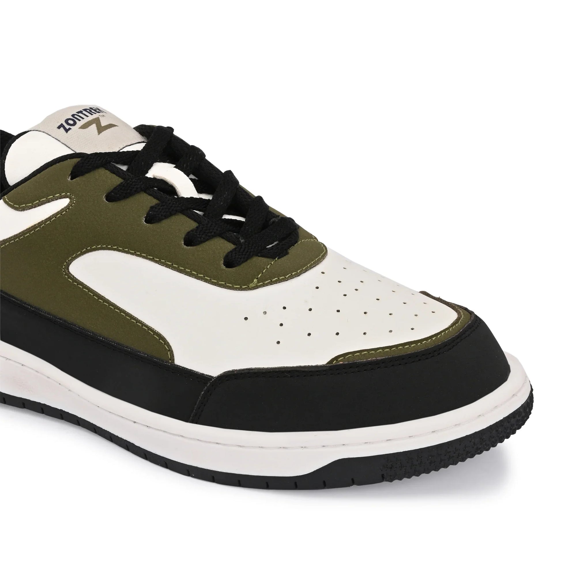 Sneaker with green, black, and white color scheme on a white background