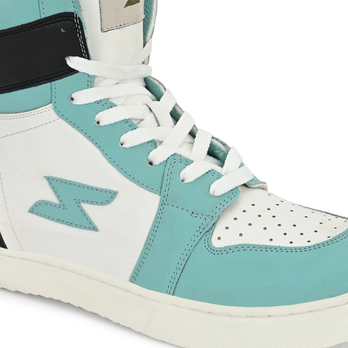 Close-up of a turquoise and white sneaker