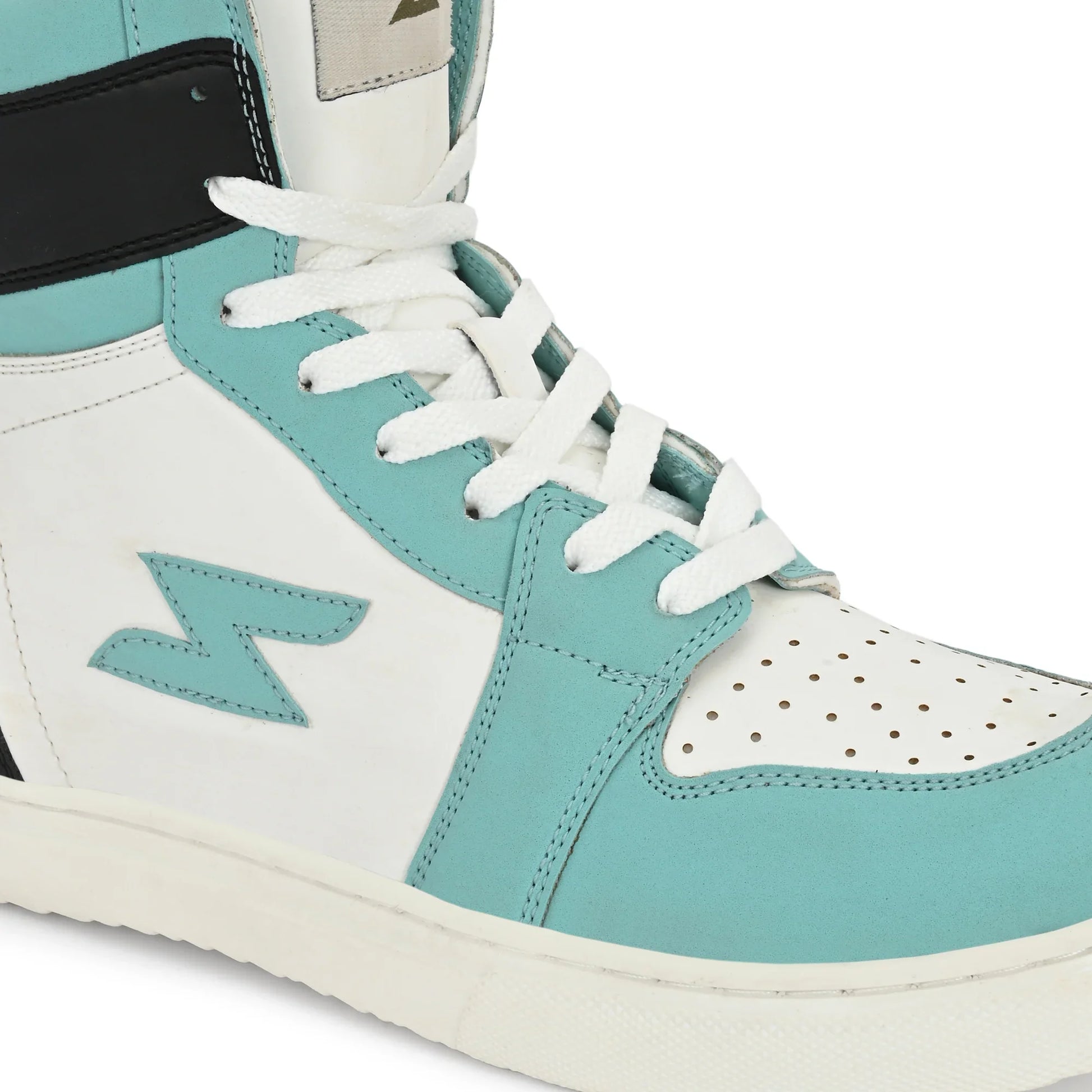 Close-up of a turquoise and white sneaker