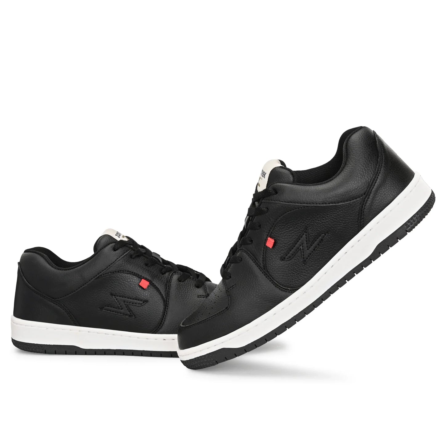 Black sneakers with white soles on a white background